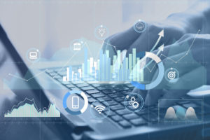 Human hands using laptop for working his business having Data Analysis Diagram.