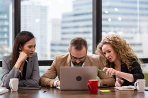 Group of businesspeople depressed from financial crisis in the meeting room