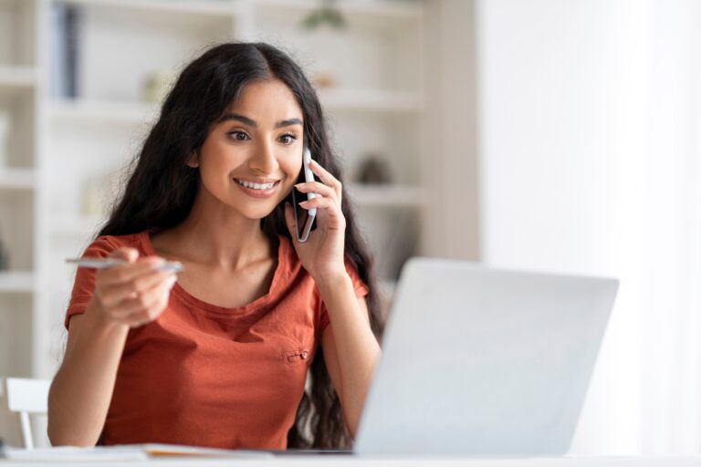 Corporate Communication. Indian Businesswoman Talking On Mobile Phone